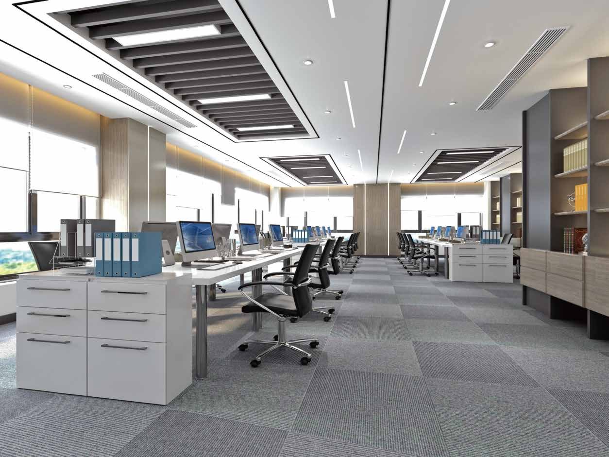 Modern executive office area with wooden desks, storage cabinets and seating